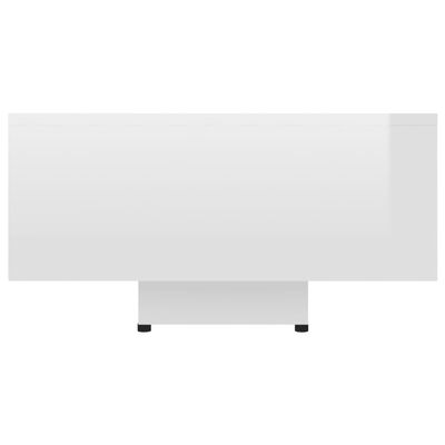 vidaXL Konferenčný stolík, lesklý biely 85x55x31 cm, drevotrieska
