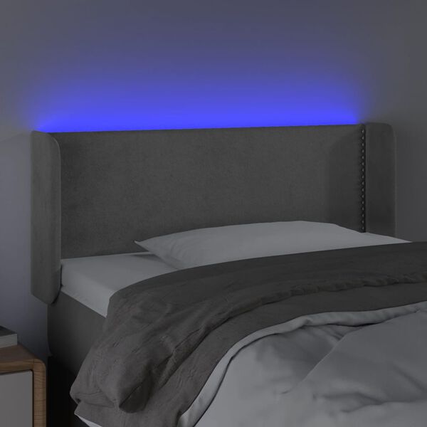 vidaXL Čelo postele s LED bledosiv&eacute; 83x16x78/88 cm zamat
