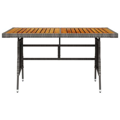 vidaXL Záhradný stôl sivý 130x70x72 cm polyratan a akáciový masív