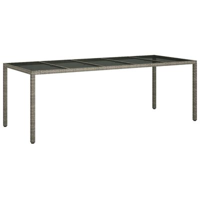 vidaXL Záhradný stôl sivý 250x100x75 cm tvrdené sklo a polyratan