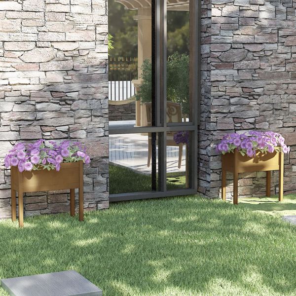 vidaXL Záhradné kvetináče 2 ks medovo-hnedé 70x31x70 cm borovicový masív