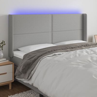 vidaXL Čelo postele s LED bledosivé 183x16x118/128 cm látka