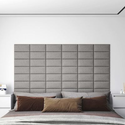 vidaXL Nástenné panely 12 ks bledosivé 30x15 cm látkové 0,54 m²
