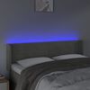 vidaXL Čelo postele s LED bledosiv&eacute; 147x16x78/88 cm zamat