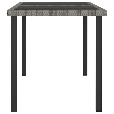 vidaXL Záhradný jedálenský stôl sivý 140x70x73 cm polyratanový