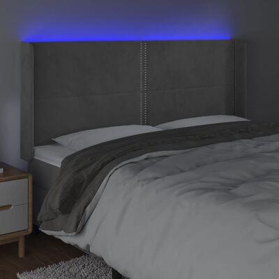 vidaXL Čelo postele s LED bledosivé 163x16x118/128 cm zamat