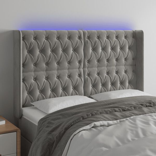 vidaXL Čelo postele s LED bledosiv&eacute; 147x16x118/128 cm zamat