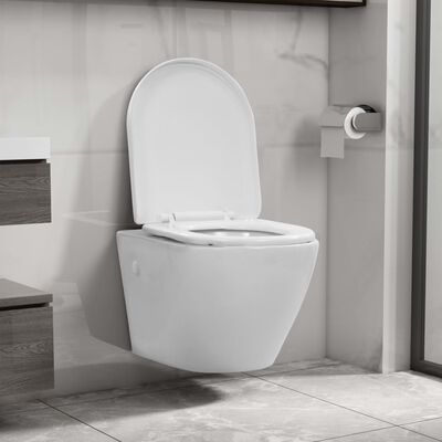 vidaXL Závesné bezokrajové WC biele keramické