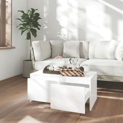 vidaXL Konferenčný stolík lesklý biely 90x50x41,5 cm drevotrieska