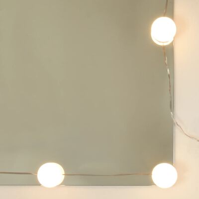vidaXL Zrkadlová skrinka s LED lesklá biela 90x31,5x62 cm
