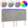 vidaXL Čelo postele s LED bledosiv&eacute; 160x5x118/128 cm zamat