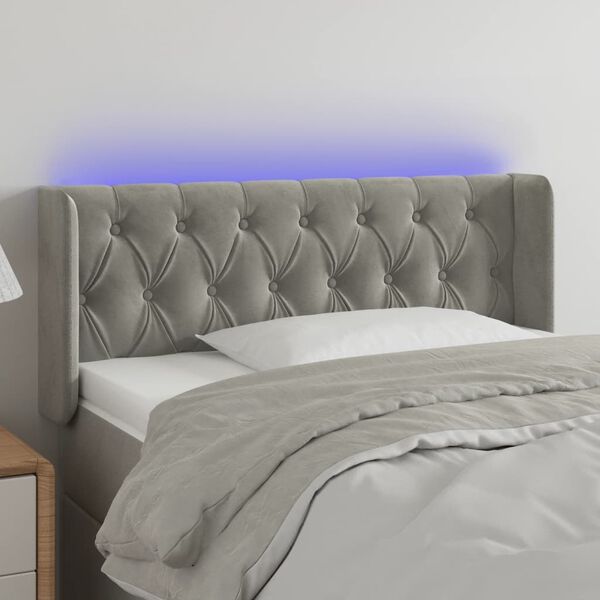 vidaXL Čelo postele s LED bledosiv&eacute; 103x16x78/88 cm zamat