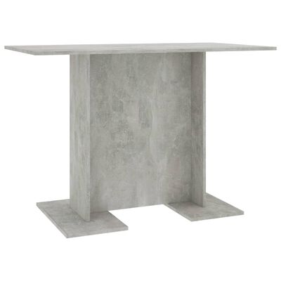 vidaXL Jedálenský stôl, betónovo sivý 110x60x75 cm, kompozitné drevo