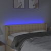 vidaXL Čelo postele s LED kr&eacute;mov&eacute; 147x16x78/88 cm l&aacute;tka