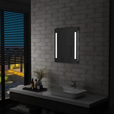 vidaXL Kúpeľňové nástenné zrkadlo s LED osvetlením a policou 50x70 cm