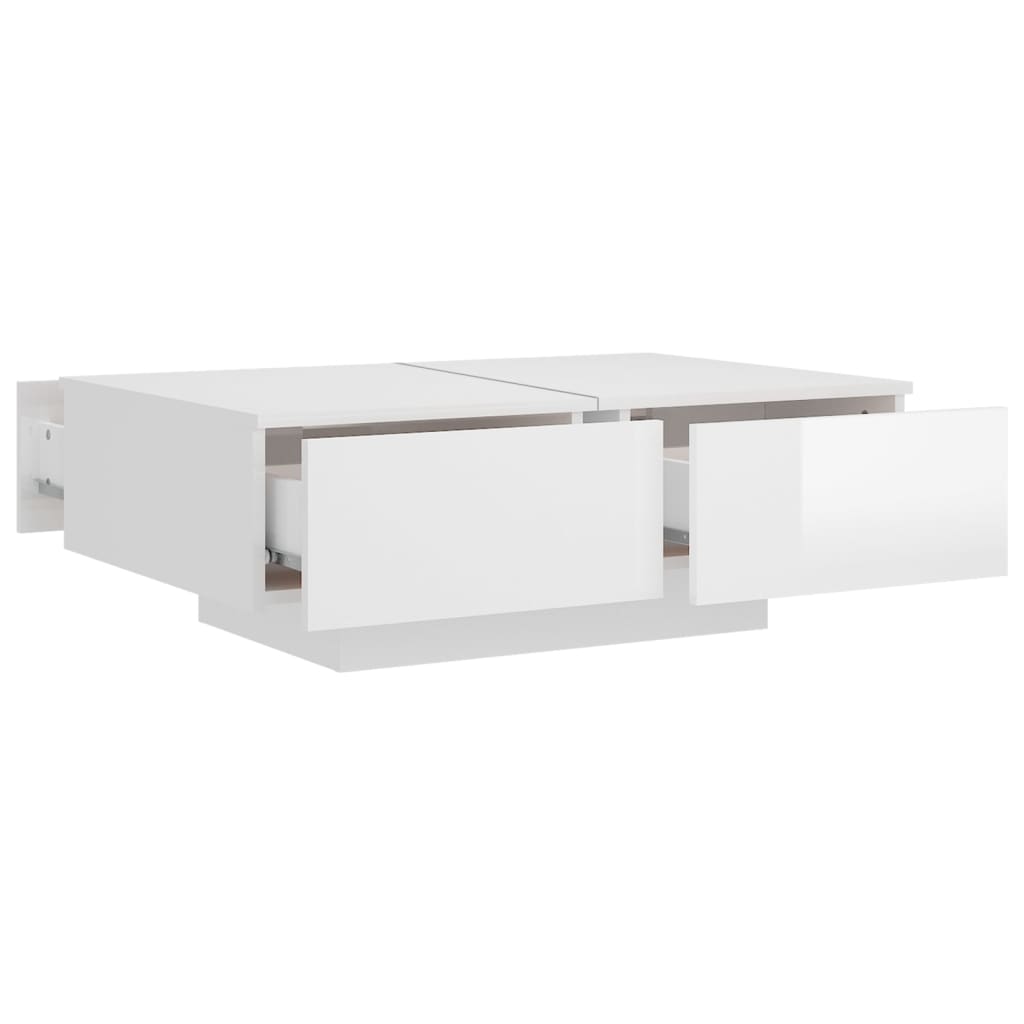 vidaXL Konferenčný stolík lesklý biely 90x60x31 cm drevotrieska
