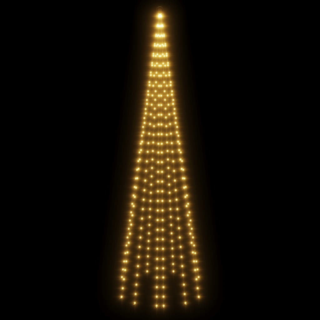 vidaXL Vianočný stromček na stožiari teplé biele svetlo 310 LED 300 cm