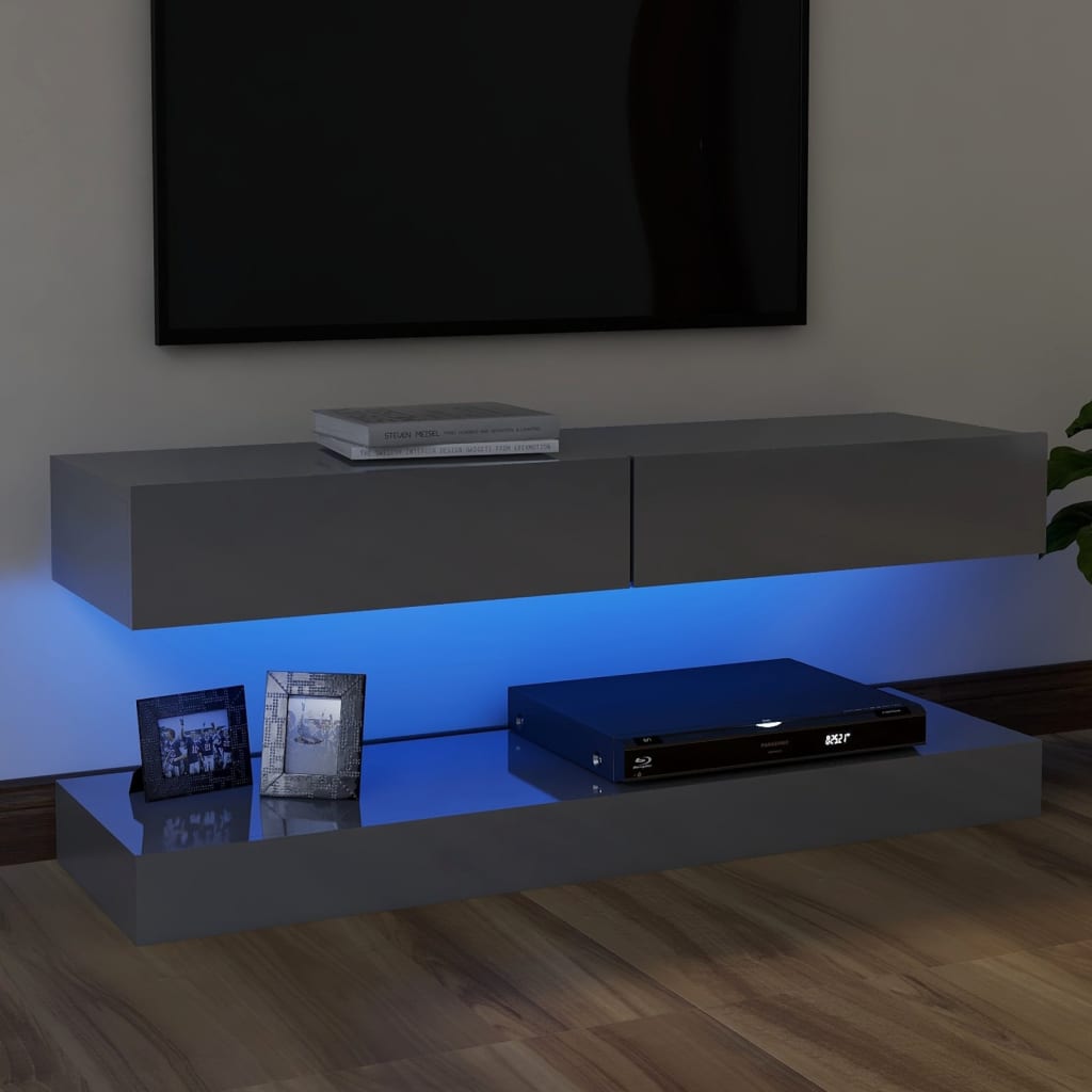 vidaXL TV skrinka s LED svetlami lesklá sivá 120x35 cm