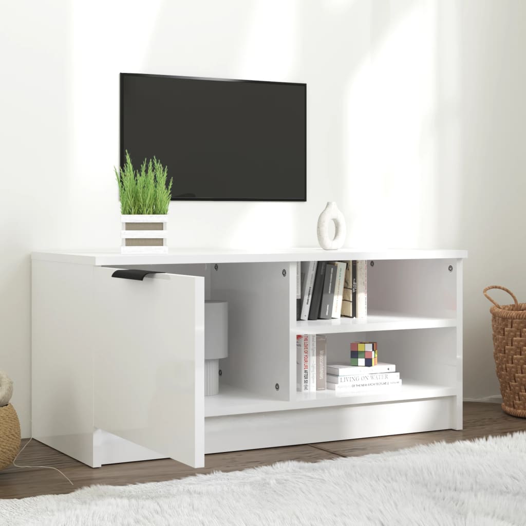 vidaXL TV stolík lesklý biely 80x35x36,5 cm spracované drevo