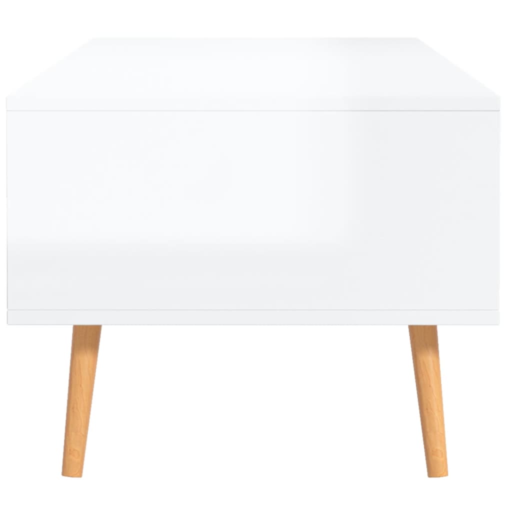 vidaXL Konferenčný stolík lesklý biely 100x49,5x43 cm drevotrieska