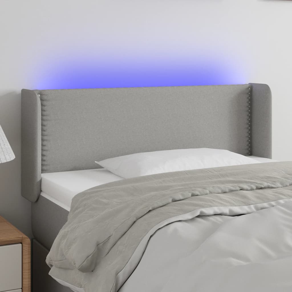 vidaXL Čelo postele s LED bledosivé 83x16x78/88 cm látka