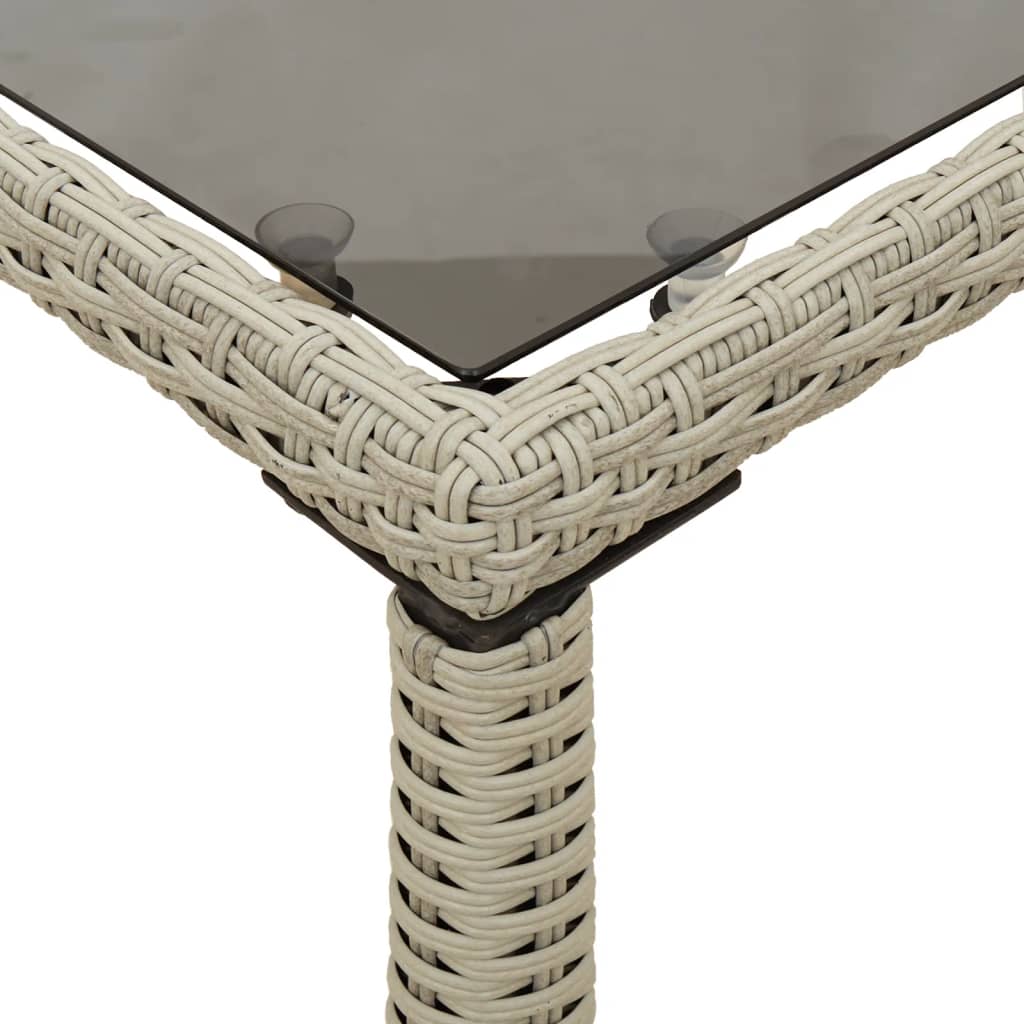 vidaXL Záhr.stôl so sklenenou doskou svetlosivý 115x54x74 cm polyratan
