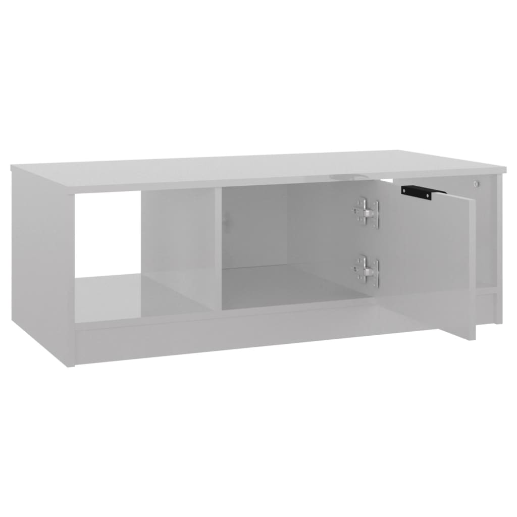 vidaXL Konferenčný stolík lesklý biely 102x50x36 cm kompozitné drevo