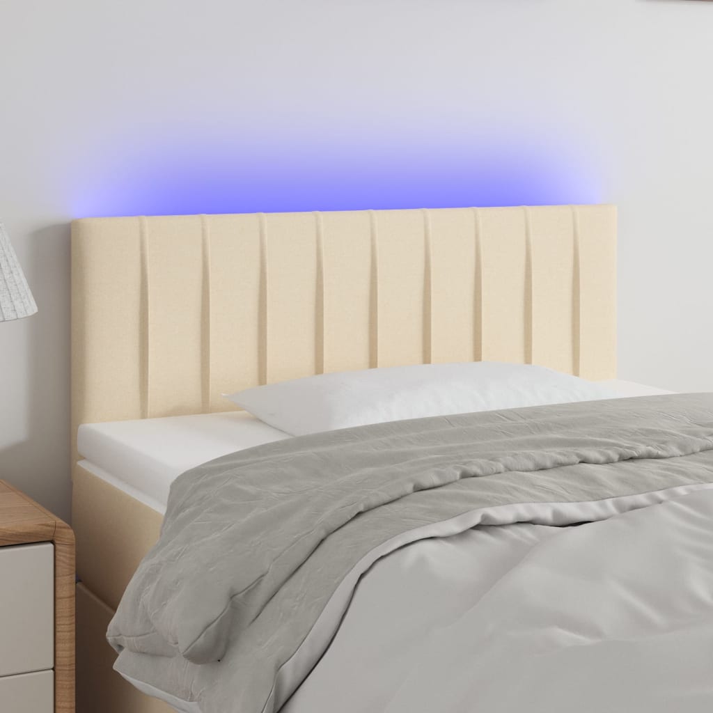 vidaXL Čelo postele s LED krémové 100x5x78/88 cm látka