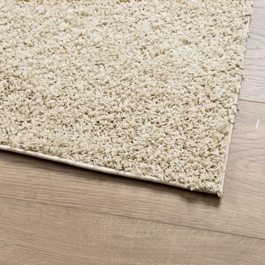 vidaXL Chlpatý koberec vysoký vlas moderný zlatý 60x110 cm