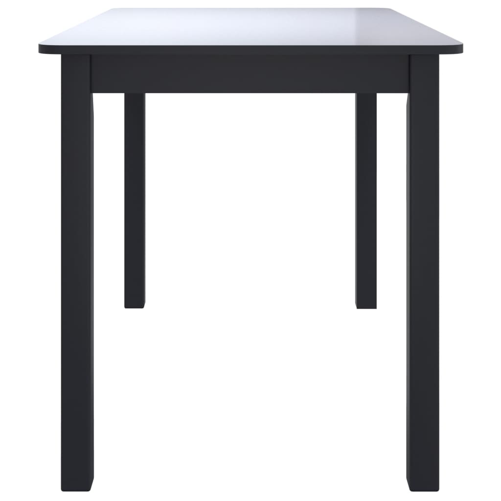 vidaXL Jedálenský stôl čierny 114x71x75 cm masívne kaučukové drevo