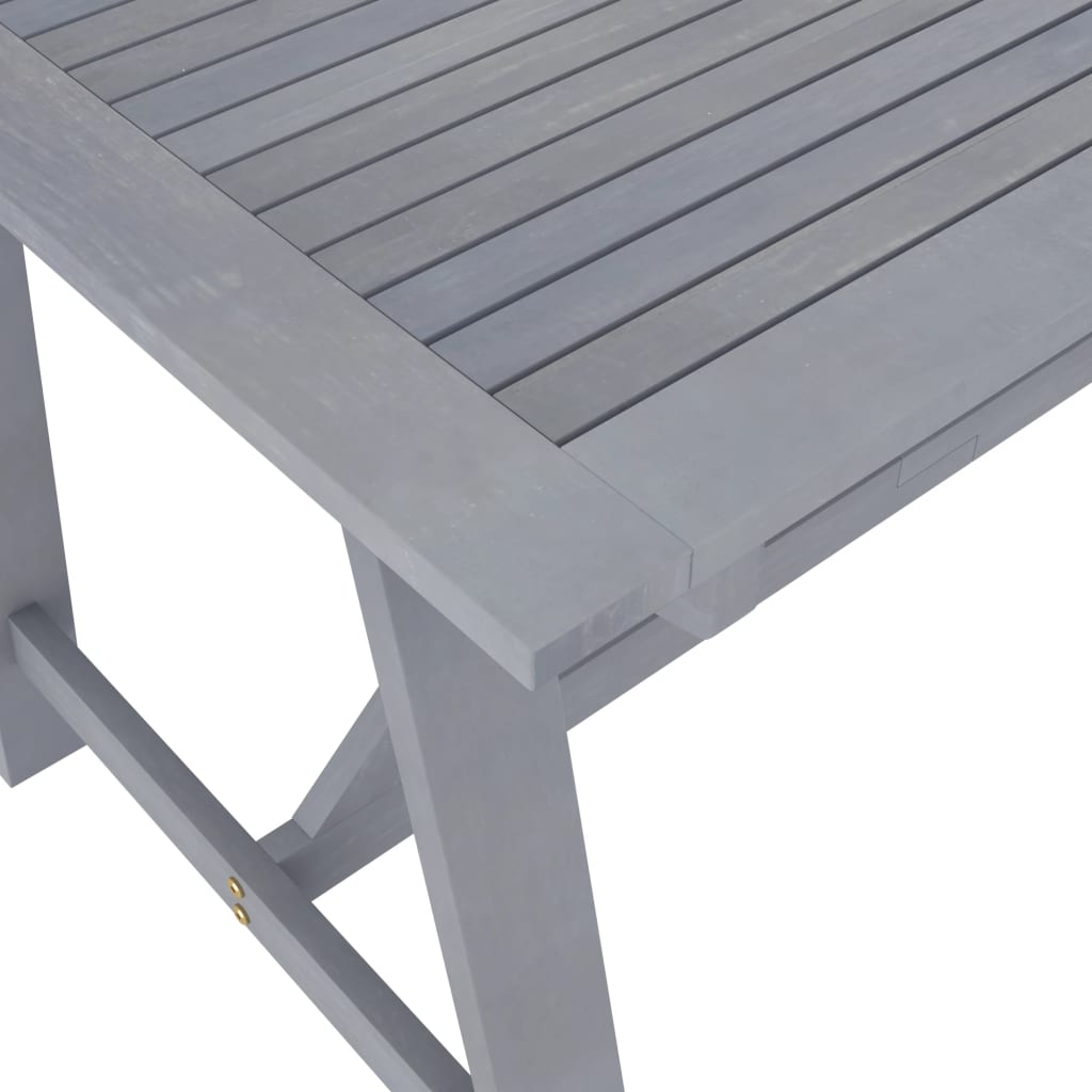 vidaXL Záhradný jedálenský stôl sivý 140x70x73,5 cm masívne akáciové drevo