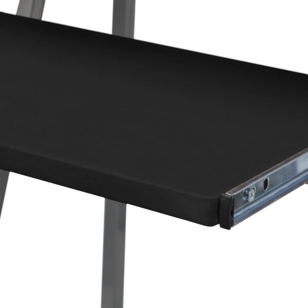 Čierny počítačový stôl s vysúvacou doskou na klávesnicu