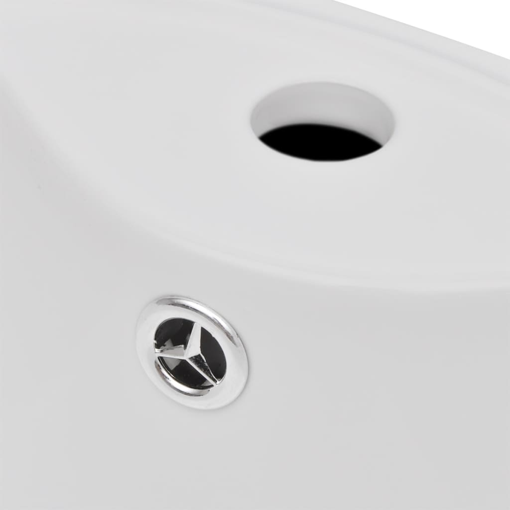 Biele stojace okrúhle keramické umývadlo do kúpeľne s prepadom a otvorom na batériu