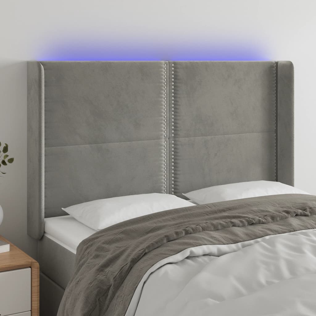 vidaXL Čelo postele s LED bledosivé 147x16x118/128 cm zamat