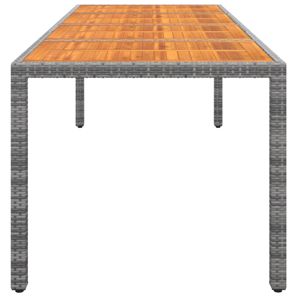 vidaXL Záhradný stôl sivý 250x100x75 cm polyratan a akáciový masív