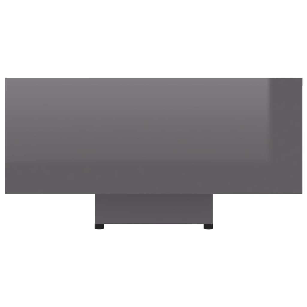 vidaXL Konferenčný stolík, lesklý sivý 85x55x31 cm, drevotrieska